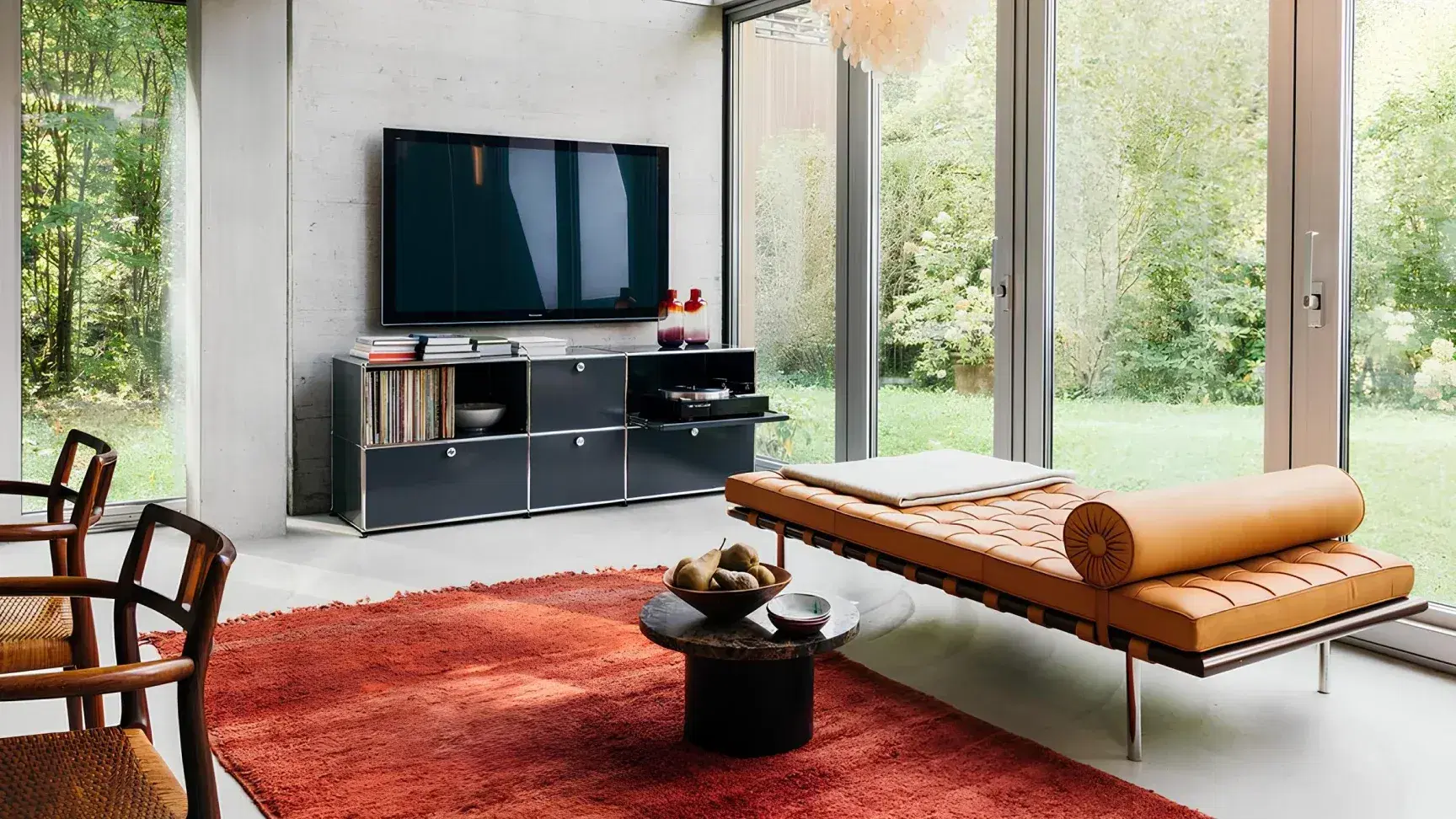 Stylish living room with Sohnne Haller Sideboard H2 Replica and a Barcelona Couch Replica by tall windows